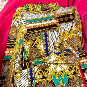 A 2 piece Bodycon, with a skirt and a top. Top is a turtleneck.